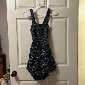 Hollister Mini romper! Sm sized navy blue romper, built in shorts, open tie back